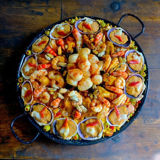 Loaded Seafood-Chicken-Scallops, Hokkigai stuffed clams and shrimp paella for 12 guests.